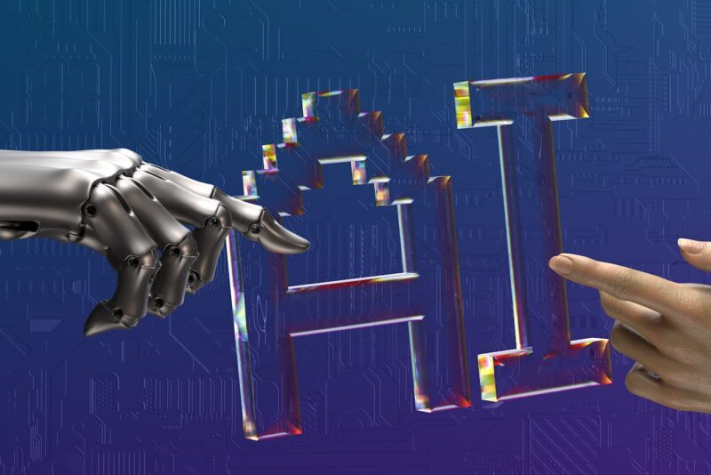 two hands touching each other in front of a blue background